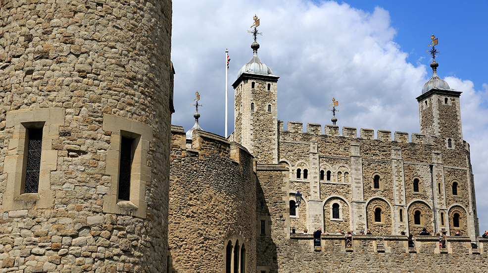 The White Tower of Tower of London behind the defensive wall